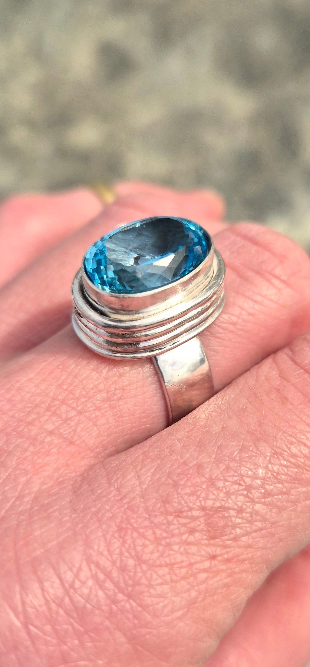 Sterling silver ring with blue topaz