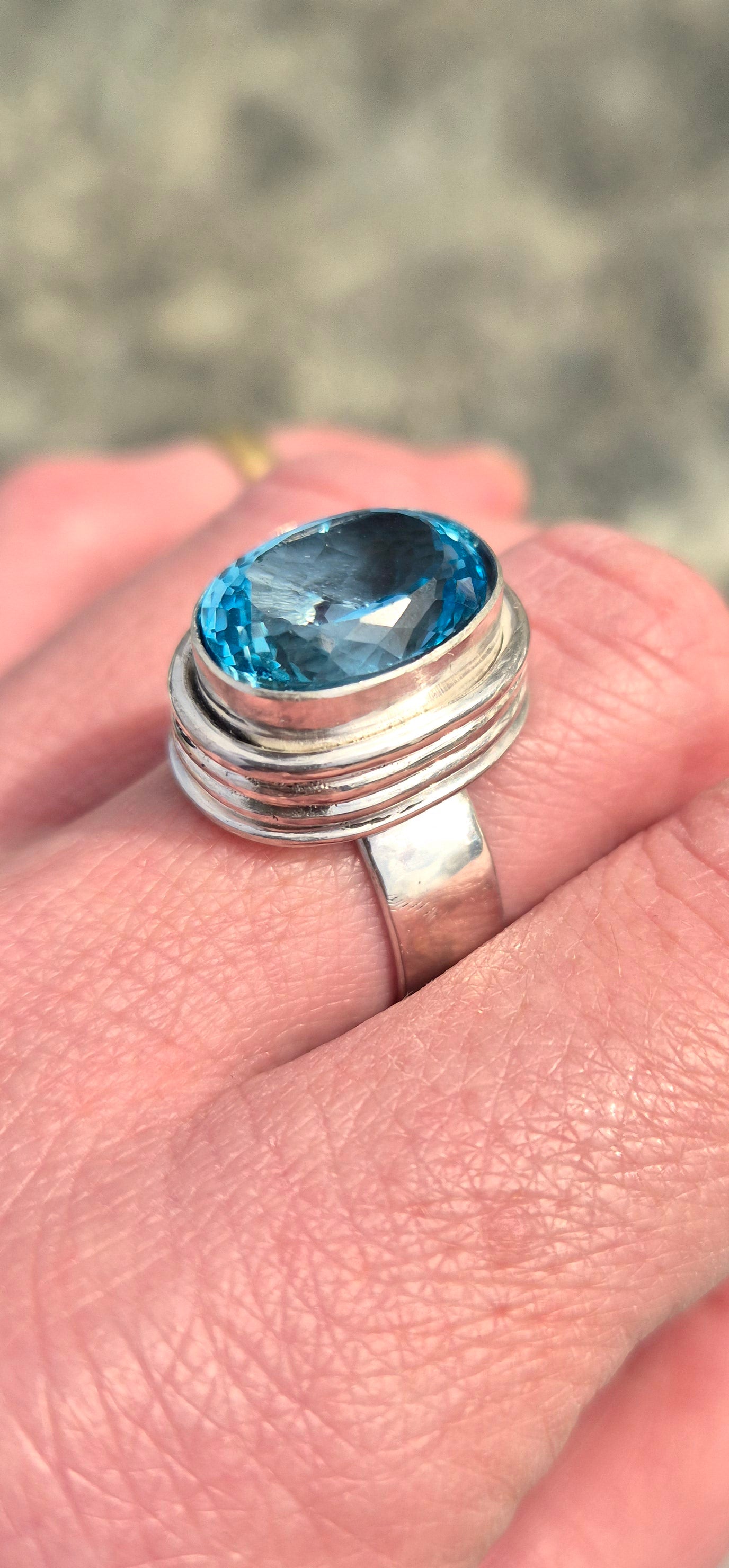 Sterling silver ring with blue topaz